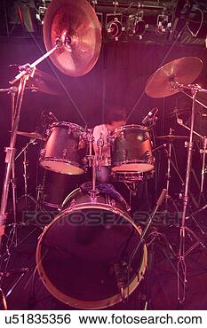 Stock Photo - young man playing 
drums on stage. 
fotosearch - search 
stock photos, 
pictures, images, 
and photo clipart