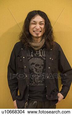 Stock Photo - young man smiling. 
fotosearch - search 
stock photos, 
pictures, images, 
and photo clipart