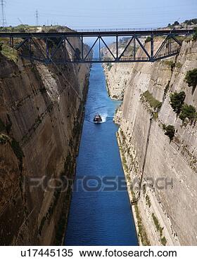 Stock Image - a boat going in 
corinth canal, 
greece. fotosearch 
- search stock 
photos, pictures, 
images, and photo 
clipart