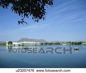 Stock Photo - distant view of 
lake palace, pichola 
lake, udaipur, 
india. fotosearch 
- search stock 
photos, pictures, 
images, and photo 
clipart