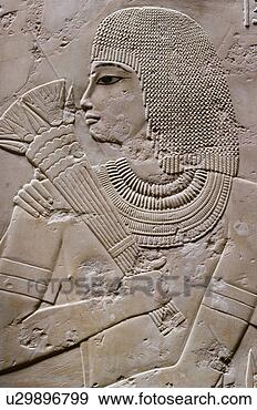Stock Photograph - a human figure 
carved on wall 
in luxor, egypt. 
fotosearch - search 
stock photos, 
pictures, images, 
and photo clipart