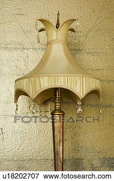 Picture - detail of ornate 
gold lamp shade. 
fotosearch - search 
stock photos, 
pictures, images, 
and photo clipart
