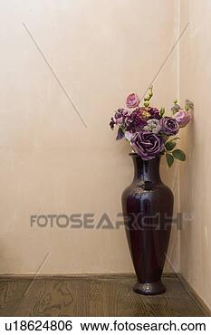 Stock Photo - detail of purple 
flower vase on 
a hardwood floor. 
fotosearch - search 
stock photos, 
pictures, images, 
and photo clipart