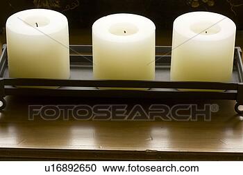 Stock Photography - group of three 
candles. fotosearch 
- search stock 
photos, pictures, 
images, and photo 
clipart