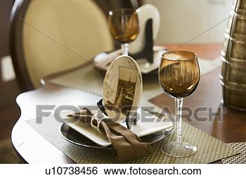 Stock Photo - place setting 
with brown wine 
glass. fotosearch 
- search stock 
photos, pictures, 
images, and photo 
clipart
