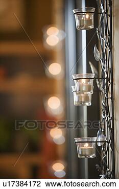 Stock Photo - tealight candles 
in holder. fotosearch 
- search stock 
photos, pictures, 
images, and photo 
clipart