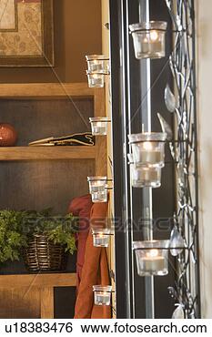 Stock Photo - tealight candles 
in holder. fotosearch 
- search stock 
photos, pictures, 
images, and photo 
clipart