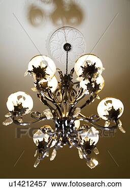 Picture - traditional ornate 
chandelier with 
crown molding. 
fotosearch - search 
stock photos, 
pictures, images, 
and photo clipart