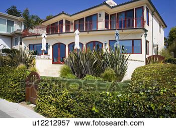 Picture - front exterior 
of california 
coastal home. 
fotosearch - search 
stock photos, 
pictures, images, 
and photo clipart
