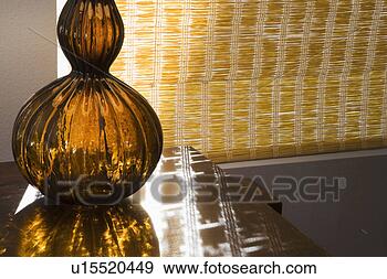 Stock Photograph - brown glass lamp 
base. fotosearch 
- search stock 
photos, pictures, 
images, and photo 
clipart