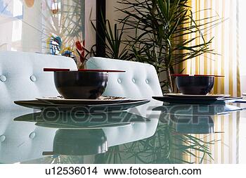 Stock Photo - contemporary dining 
table with place 
settings and chopsticks. 
fotosearch - search 
stock photos, 
pictures, images, 
and photo clipart