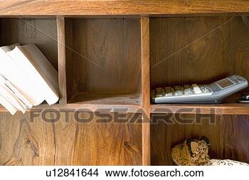 Stock Photo - detail of built 
in shelves on 
a desk, close 
up. fotosearch 
- search stock 
photos, pictures, 
images, and photo 
clipart