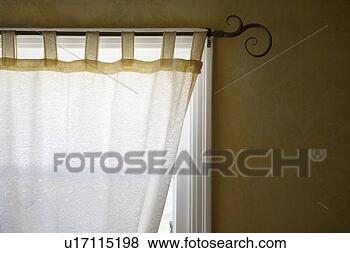 Stock Photo - detail of decorative 
metal curtain 
rod with curtain. 
fotosearch - search 
stock photos, 
pictures, images, 
and photo clipart