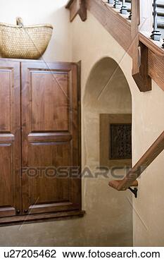 Stock Photo - detail of hallway 
beneath staircase. 
fotosearch - search 
stock photos, 
pictures, images, 
and photo clipart