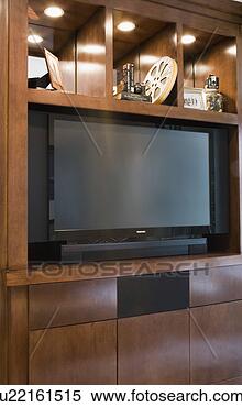 Stock Image - entertainment 
center with large 
television. fotosearch 
- search stock 
photos, pictures, 
images, and photo 
clipart