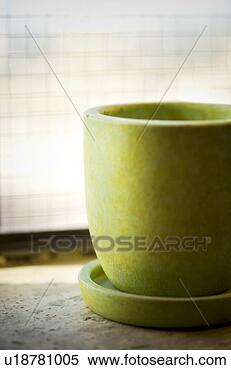 Stock Image - green cup on saucer. 
fotosearch - search 
stock photos, 
pictures, images, 
and photo clipart
