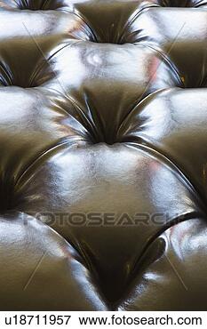 Picture - leather cushion 
with buttons. 
fotosearch - search 
stock photos, 
pictures, images, 
and photo clipart