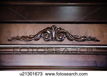 Stock Photo - ornate detail 
on wood armoire. 
fotosearch - search 
stock photos, 
pictures, images, 
and photo clipart