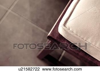Stock Photo - wooden bar stool 
with cushion, 
close up. fotosearch 
- search stock 
photos, pictures, 
images, and photo 
clipart