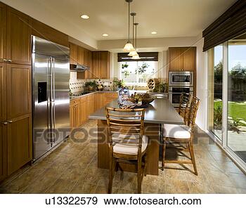 Stock Photograph - contemporary kitchen 
with large island. 
fotosearch - search 
stock photos, 
pictures, images, 
and photo clipart