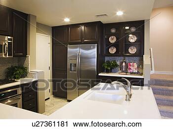 Stock Photography - contemporary kitchen 
with penninsula. 
fotosearch - search 
stock photos, 
pictures, images, 
and photo clipart