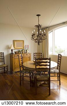 Stock Photography - detail of dinning 
table illuminated 
with large window. 
fotosearch - search 
stock photos, 
pictures, images, 
and photo clipart