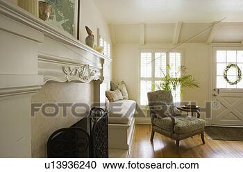 Stock Photography - fireplace and 
armchair in living 
room. fotosearch 
- search stock 
photos, pictures, 
images, and photo 
clipart