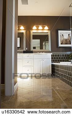 Stock Photo - large brown master 
bathroom. fotosearch 
- search stock 
photos, pictures, 
images, and photo 
clipart