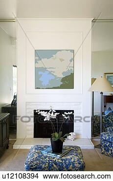 Stock Photo - living room with 
fireplace and 
blue accents. 
fotosearch - search 
stock photos, 
pictures, images, 
and photo clipart
