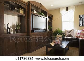 Stock Image - living room with 
large entertainment 
center. fotosearch 
- search stock 
photos, pictures, 
images, and photo 
clipart