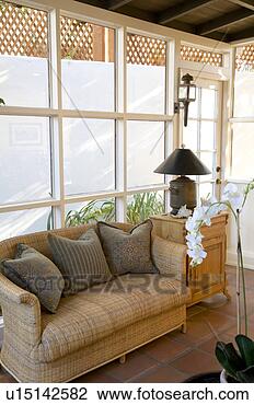 Stock Photo - sofa in front 
of window. fotosearch 
- search stock 
photos, pictures, 
images, and photo 
clipart
