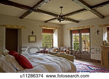 Stock Photo - spanish style 
bedroom with red 
accents. fotosearch 
- search stock 
photos, pictures, 
images, and photo 
clipart