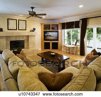 Picture - traditional living 
room with couch, 
 fireplace,  entertainment 
center. fotosearch 
- search stock 
photos, pictures, 
images, and photo 
clipart