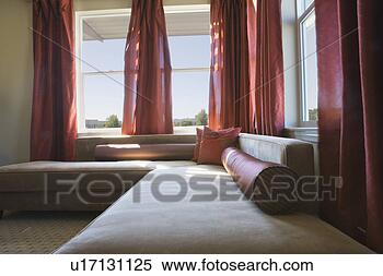 Stock Image - white contemporary 
sofa with red 
accents. fotosearch 
- search stock 
photos, pictures, 
images, and photo 
clipart