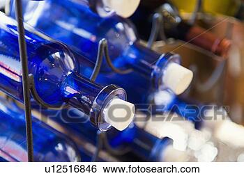 Stock Photo - blue wine bottles 
with white corks. 
fotosearch - search 
stock photos, 
pictures, images, 
and photo clipart