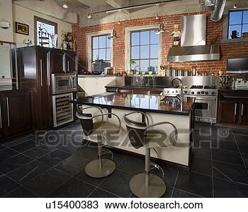 Stock Photo - contemporary kitchen 
with stainless 
steel hood. fotosearch 
- search stock 
photos, pictures, 
images, and photo 
clipart