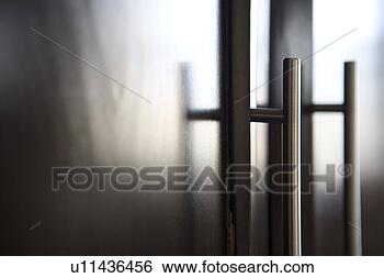Stock Photo - detail of chrome 
handles on dark 
wood. fotosearch 
- search stock 
photos, pictures, 
images, and photo 
clipart