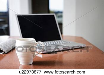 Picture - laptop and coffee 
mug. fotosearch 
- search stock 
photos, pictures, 
images, and photo 
clipart