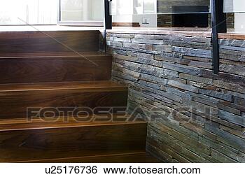 Stock Photo - modern hardwood 
 stairway with 
stone wall. fotosearch 
- search stock 
photos, pictures, 
images, and photo 
clipart