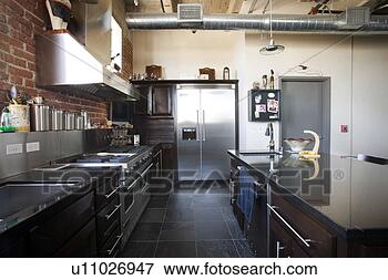 Picture - modern kitchen 
with stainless 
steel appliances. 
fotosearch - search 
stock photos, 
pictures, images, 
and photo clipart