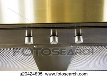 Stock Image - overhead chrome/stainless 
steel stovetop 
fan. fotosearch 
- search stock 
photos, pictures, 
images, and photo 
clipart