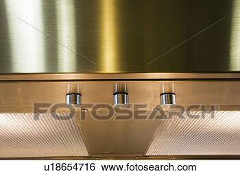 Stock Photo - overhead chrome/strainless 
steel stovetop 
vent. fotosearch 
- search stock 
photos, pictures, 
images, and photo 
clipart