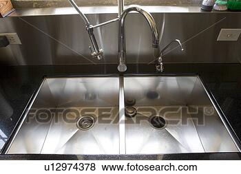 Stock Photo - stainless steel 
kitchen sink. 
fotosearch - search 
stock photos, 
pictures, images, 
and photo clipart