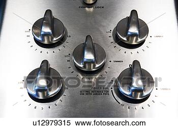 Stock Image - stainless steel 
knobs on stove 
top. fotosearch 
- search stock 
photos, pictures, 
images, and photo 
clipart
