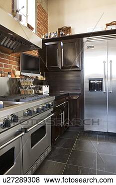 Stock Photo - vignette of stainless 
steel appliances. 
fotosearch - search 
stock photos, 
pictures, images, 
and photo clipart