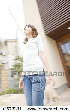 Stock Photography - woman looking 
up to the sky. 
fotosearch - search 
stock photos, 
pictures, images, 
and photo clipart