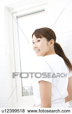 Stock Photo - woman nearby window. 
fotosearch - search 
stock photos, 
pictures, images, 
and photo clipart