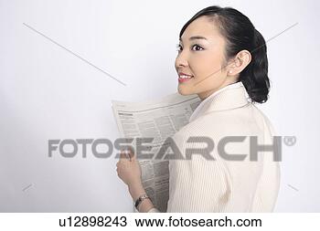 Stock Photo - business lady 
reading a newspaper. 
fotosearch - search 
stock photos, 
pictures, images, 
and photo clipart