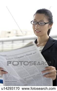 Stock Photography - business lady 
who reads a newspaper. 
fotosearch - search 
stock photos, 
pictures, images, 
and photo clipart