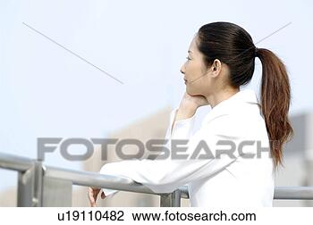 Stock Photo - business lady 
who rests. fotosearch 
- search stock 
photos, pictures, 
images, and photo 
clipart